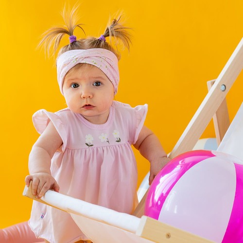 Dětská růžová tunika body s květinami