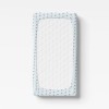 Jersey fitted sheet with flowers blue with stars