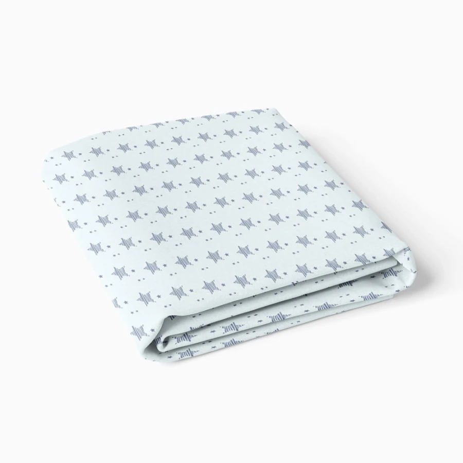 Jersey fitted sheet with flowers blue with stars