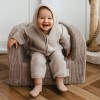Beige children's overall made of merino wool fleece