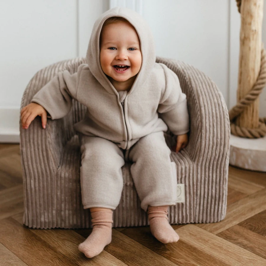 Beige children's overall made of merino wool fleece