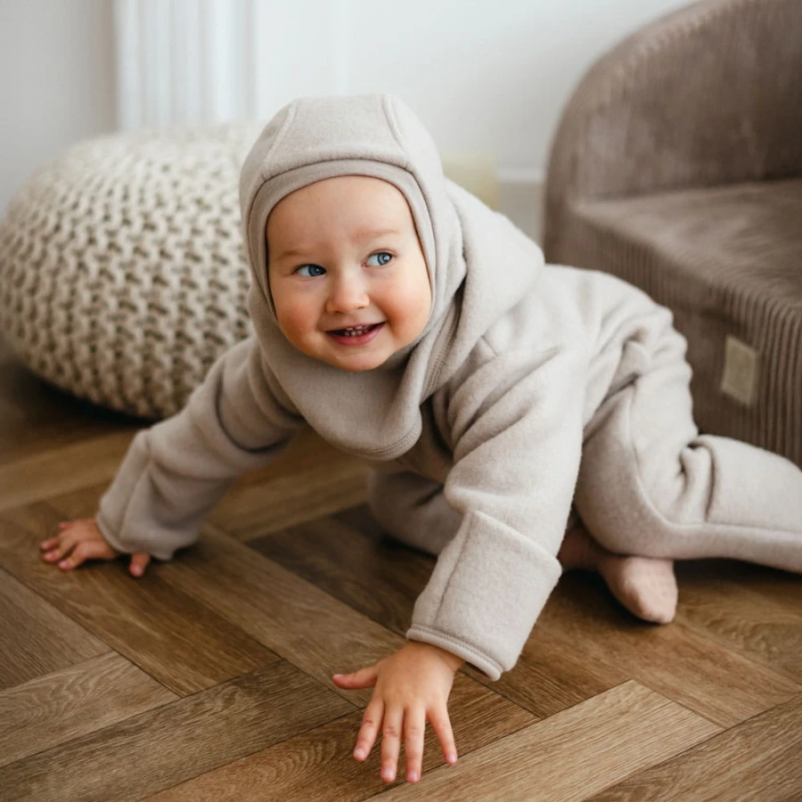 Beige children's overall made of merino wool fleece