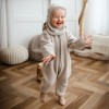 Beige children's overall made of merino wool fleece