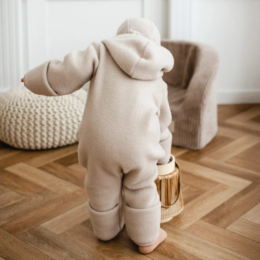 Beige children's overall made of merino wool fleece