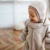 Beige baby balaclava made of fleece with merino wool lining