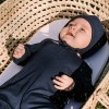 Navy blue baby sleepsuit made of merino wool