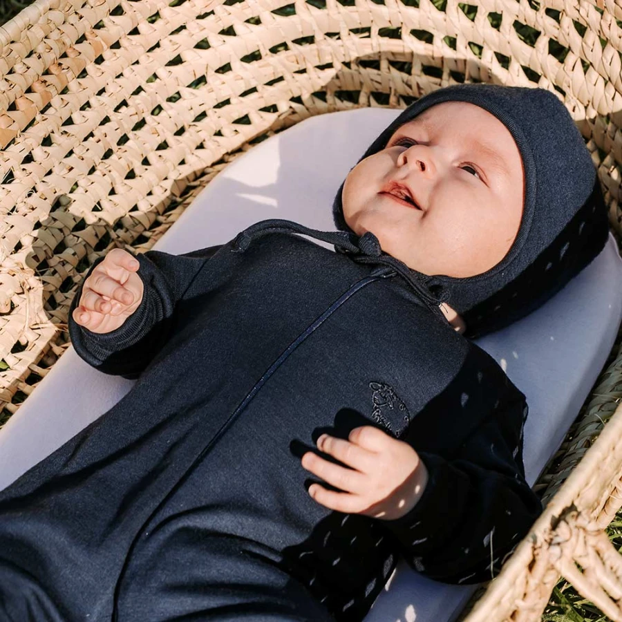 Navy blue baby sleepsuit made of merino wool