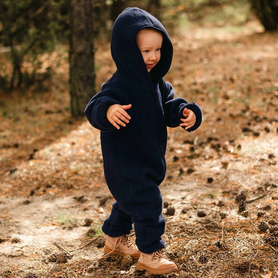 Tmavě modrá dětská kombinéza z merino fleecu