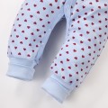 Blue footless baby romper with hearts, grows with your child