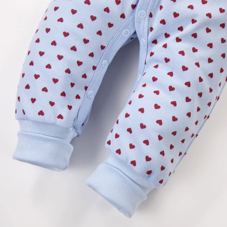 Blue footless baby romper with hearts, grows with your child