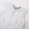 White baby sleeping bag with leaf print