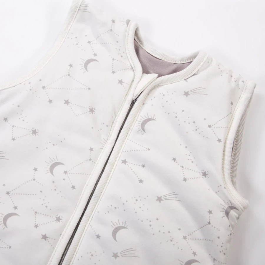 Ecru baby sleeping bag with star print