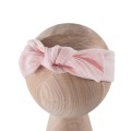 Pink children’s headband with muslin bow