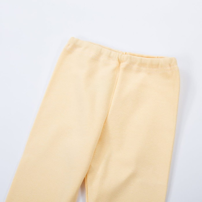 legginsy dziecięce żółte z bawełny pastelowe