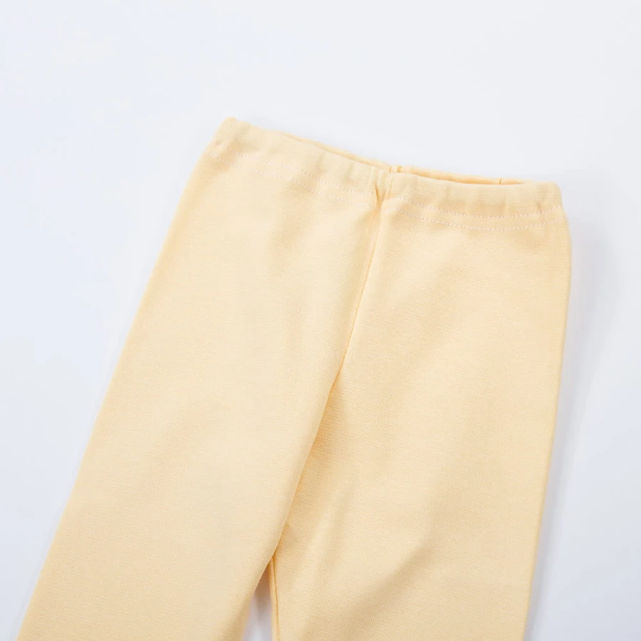 legginsy dziecięce żółte z bawełny pastelowe