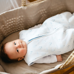 White baby sleeping bag with balloon print