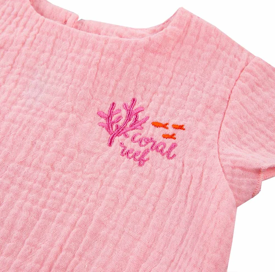 Pink muslin blouse and navy shorts set