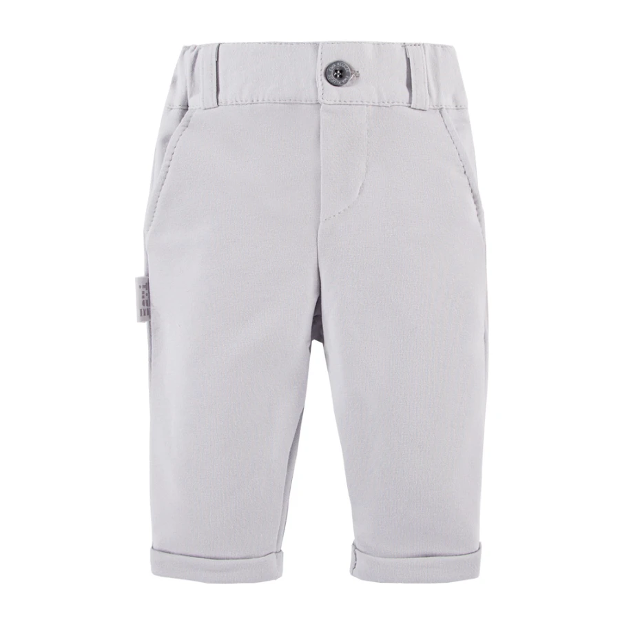 Set bílého košilového body, šedých elegantních kalhot a šedého saka