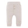 Beige ribbed leggings and ruffle sweatshirt set