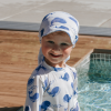 Beige UV sun cap with whale print