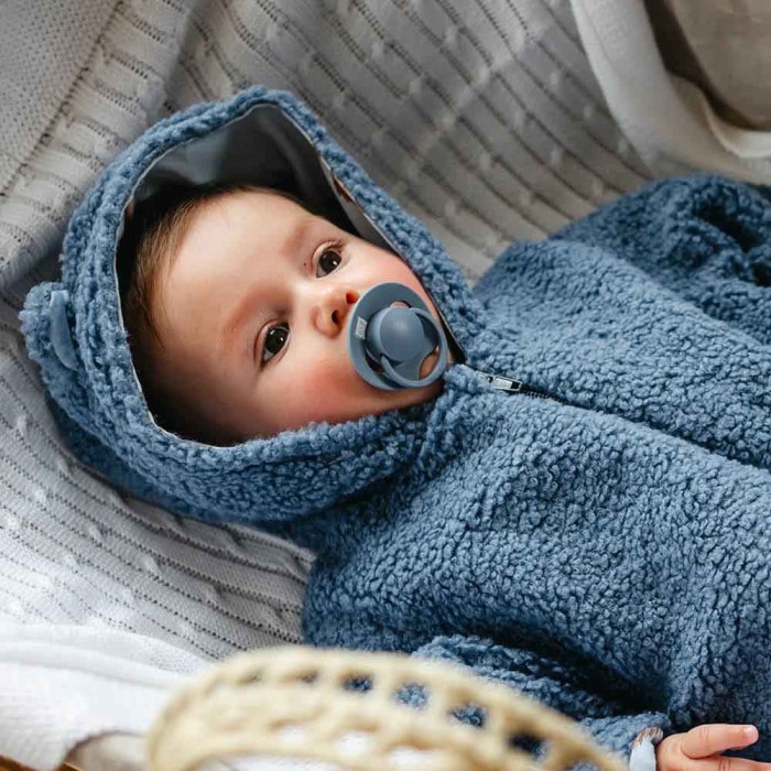 Blue sherpa baby romper with hedgehog print