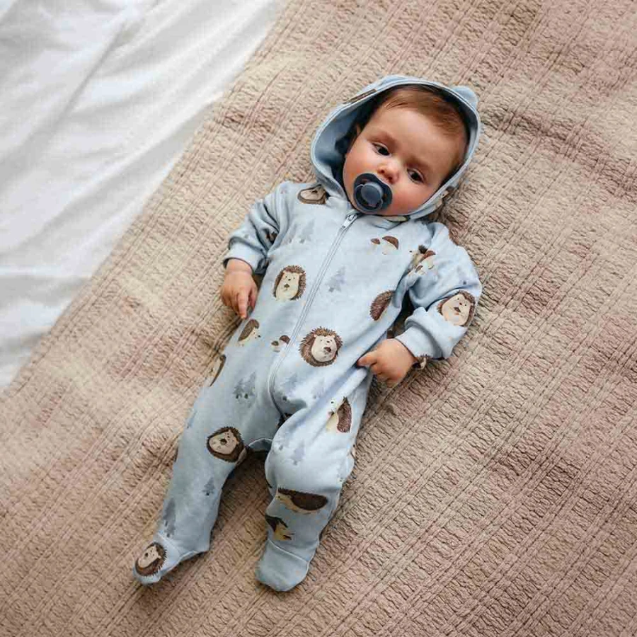 Blue baby tracksuit romper with feet and hedgehog print