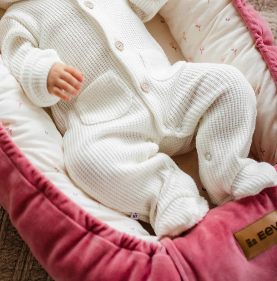 Knitted baby romper