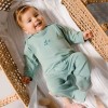 Romper suit green with leaves pattern