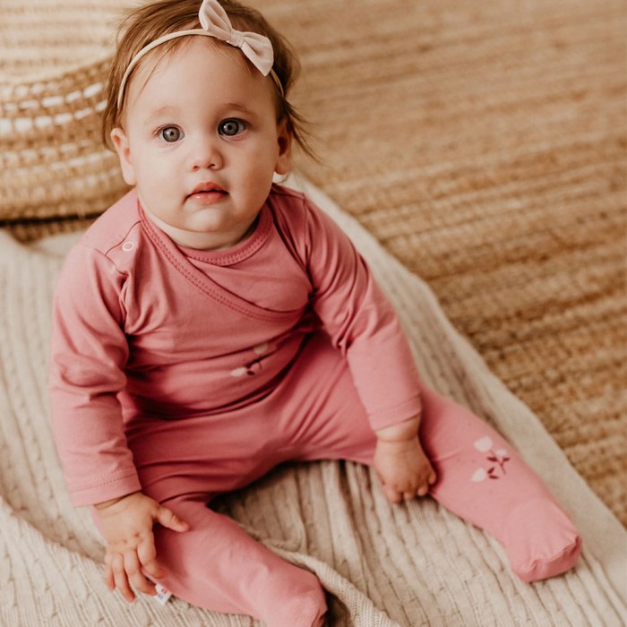 Joggers with feet with a flower pattern pink