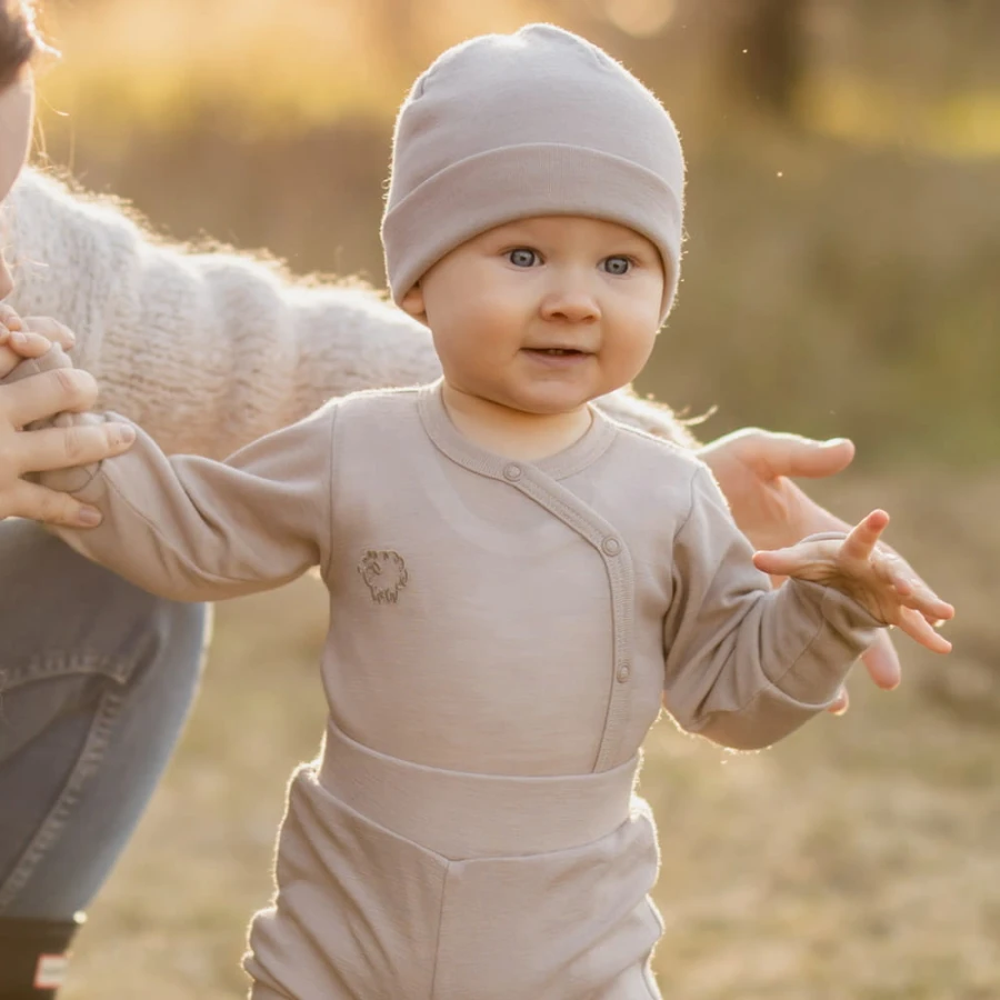 Cardigan baby body from merino wool beige