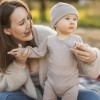Cardigan baby body from merino wool beige